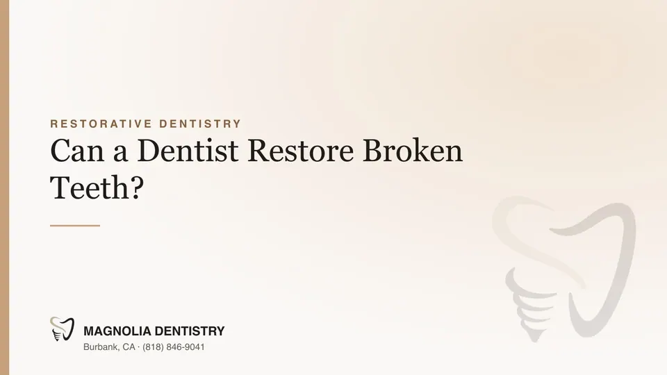 Dentist examining a broken tooth before restoration