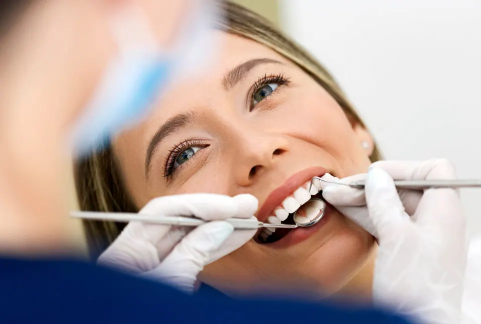 Patient reviewing dental treatment plan and insurance estimate