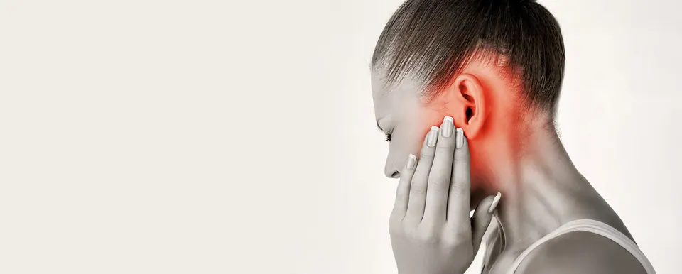 Patient with jaw and ear pain caused by TMD